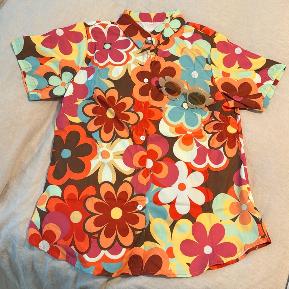 Hippie flower power button up shirt and glasses.